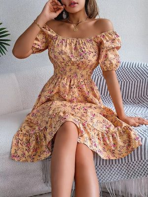 Blommig off-shoulder midiklänning