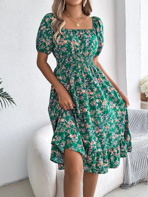 Blommig off-shoulder midiklänning