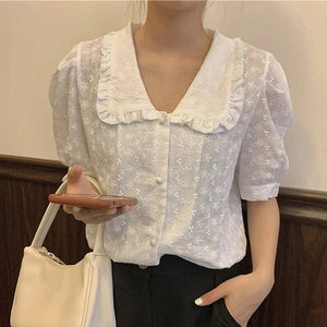 Blus med spetskrage