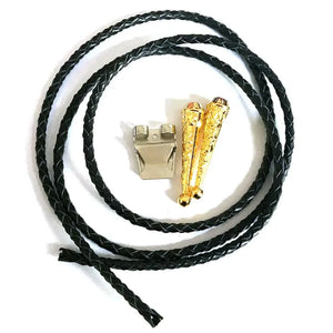 Bolo tie med korslagda revolvrar i metall