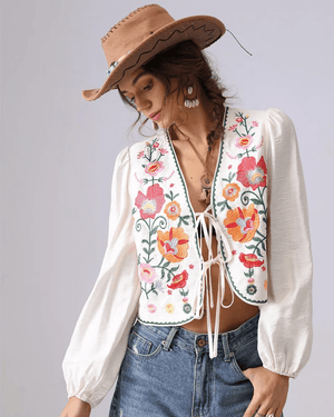 Broderad blus med blommor