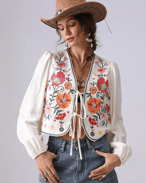 Broderad blus med blommor