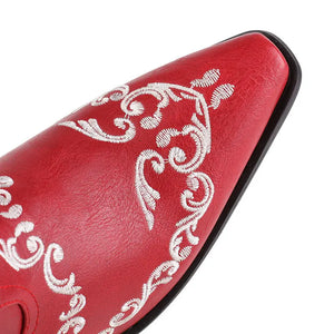 Cowboyboots med broderad skelettdesign och chunky klack