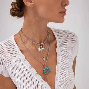 Flerradigt halsbandsset i western stil med turkos och cowboy-berlocker Silver med 3st