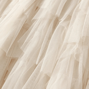 Maxikjol med en böljande kaskad av tyll