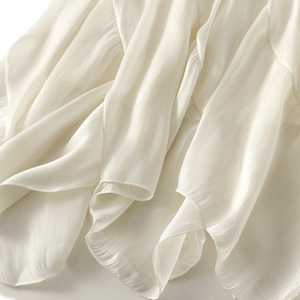 Midikjol med asymmetrisk drapering