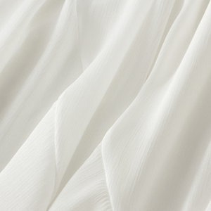 Midikjol med asymmetrisk drapering