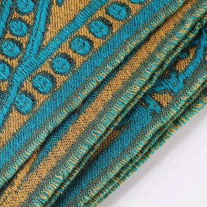 Öppen poncho med blommigt jacquardmönster