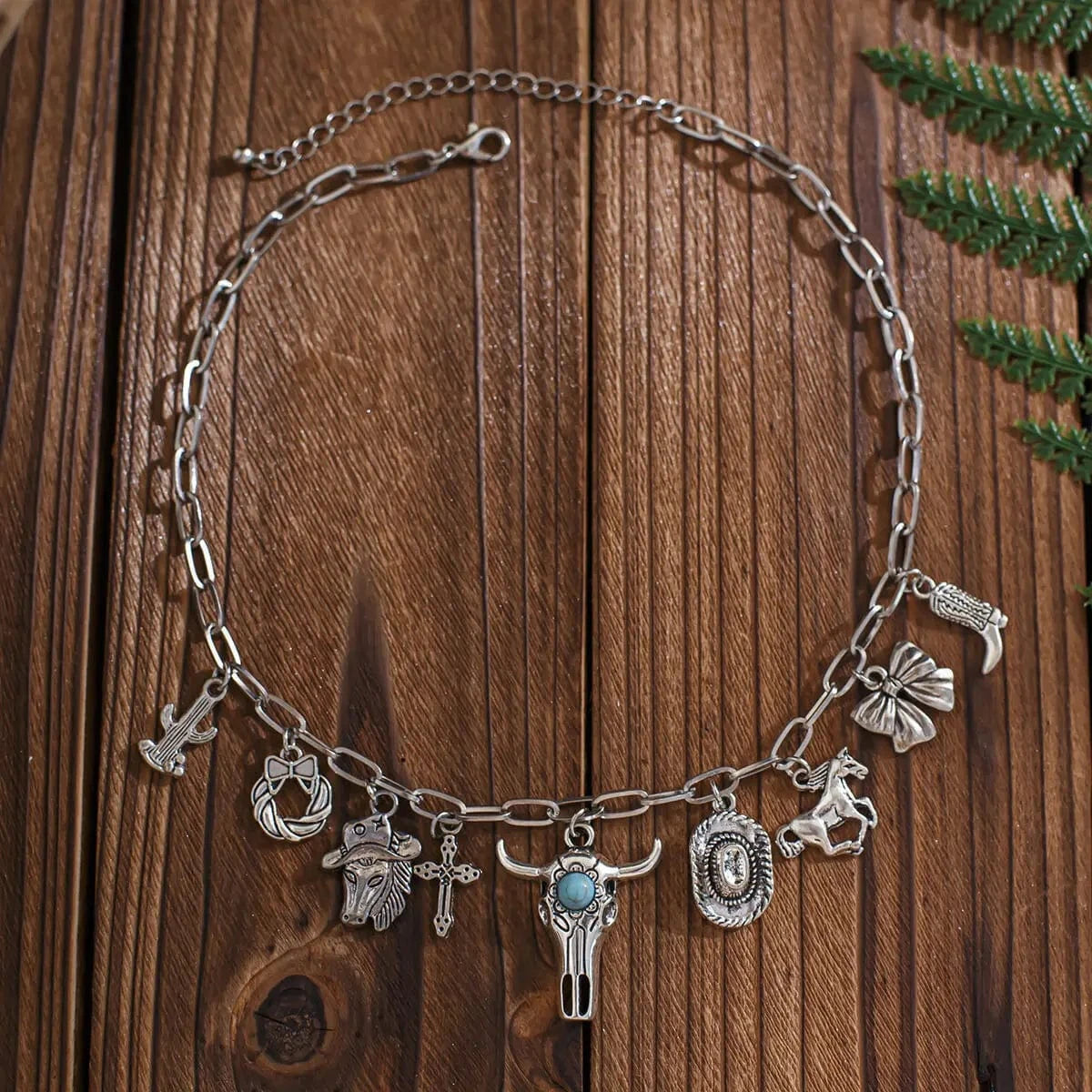 Berlockhalsband i western stil med western-motiv och turkos