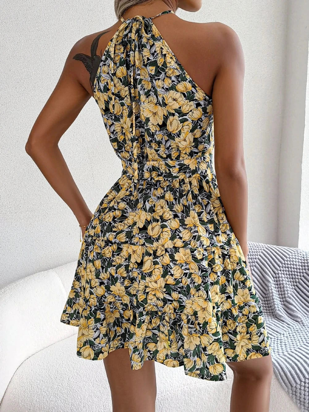 Blommig klänning halterneck