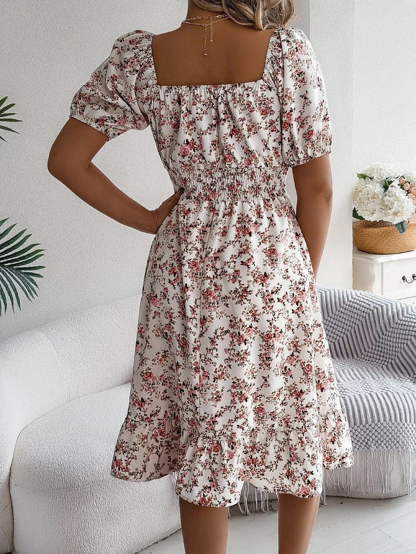Blommig off-shoulder midiklänning