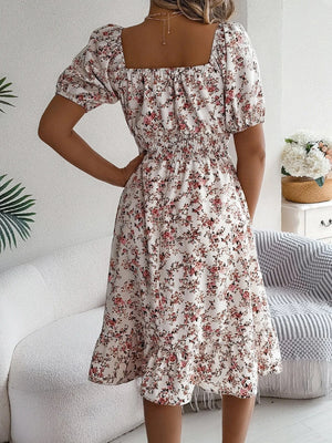 Blommig off-shoulder midiklänning