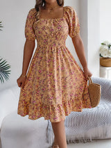 Blommig off-shoulder midiklänning Gul / S