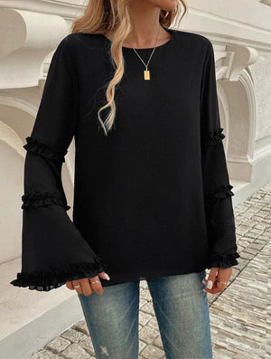 Blus med trumpetärm