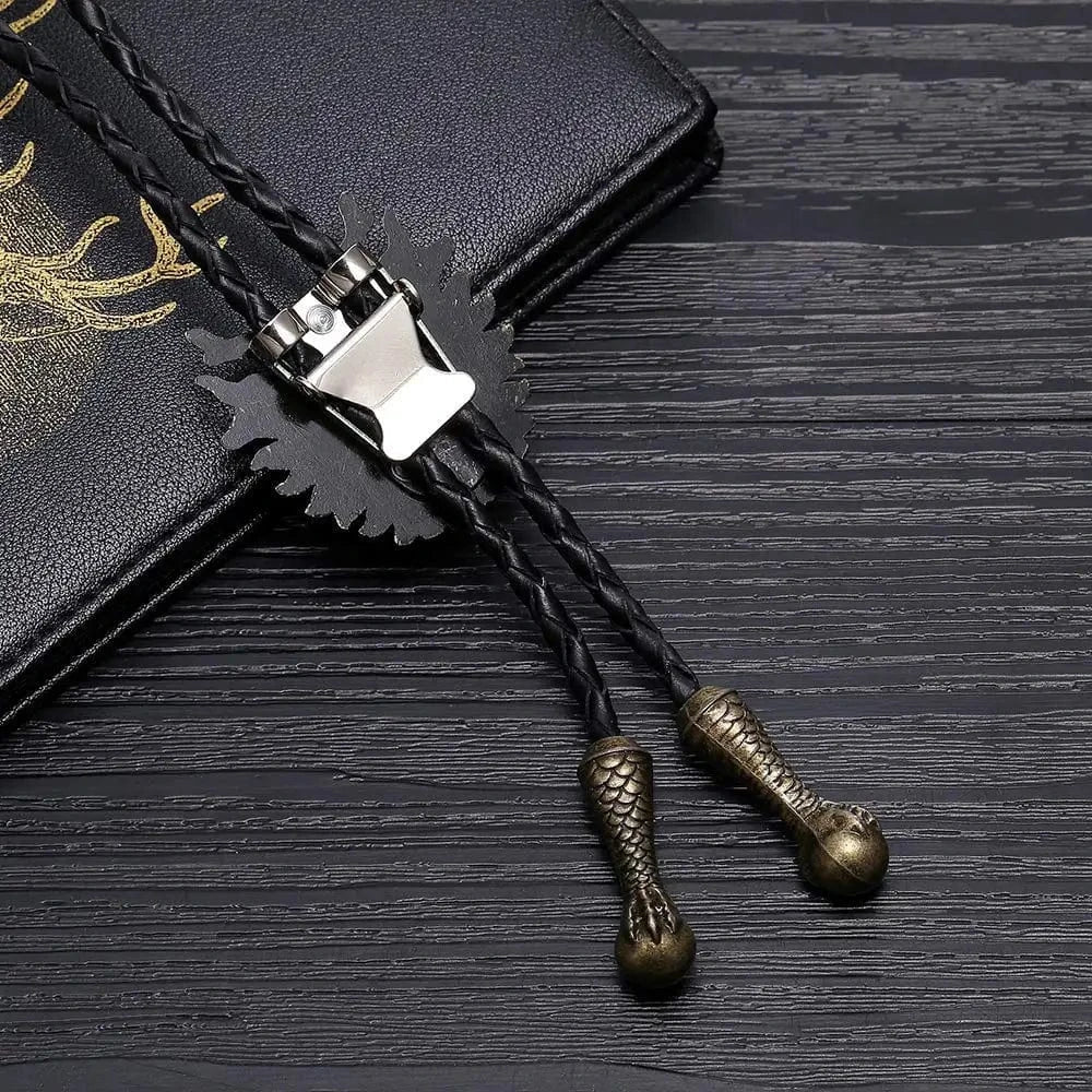 Bolo tie i läder med drakhuvud i metall