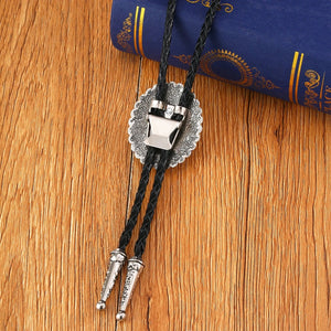 Bolo tie i solrosformad metallram och turkos sten Turkosblå