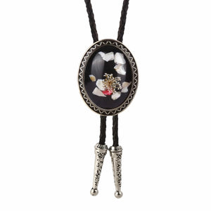 Bolo tie med glasdetalj och ovalt vintagehänge Svart och vit