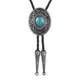 Bolo tie med oval sten och dekorativ antiksilverram Turkosgrön