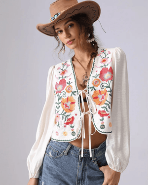Broderad blus med blommor