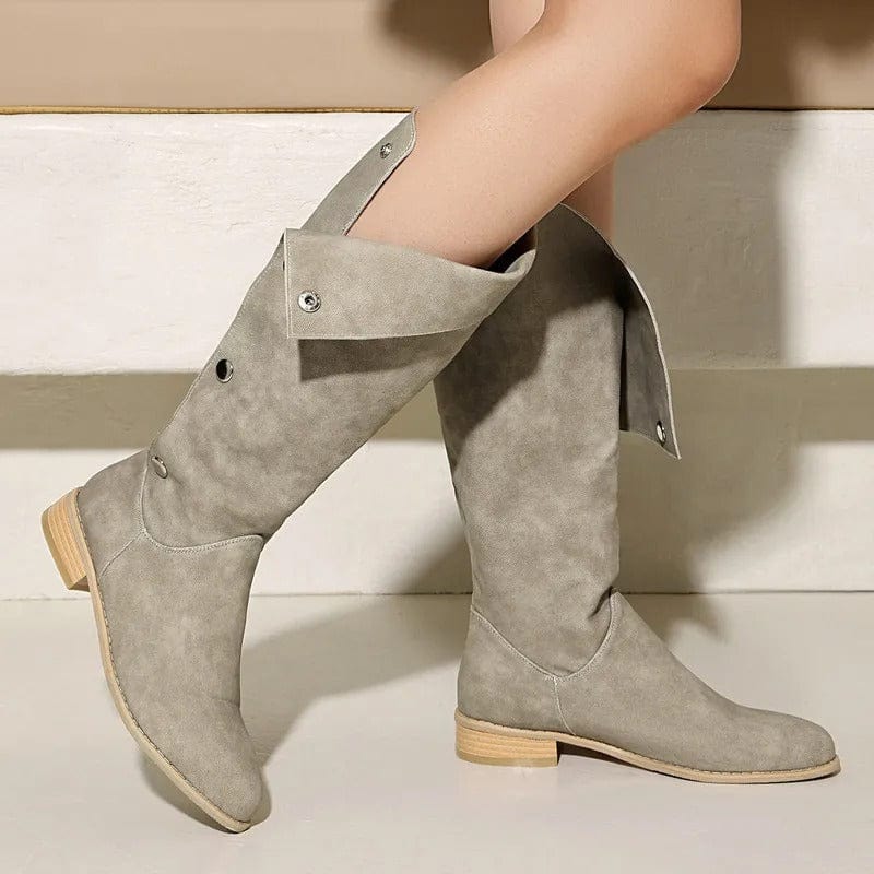 Cowboyboots i mockalook med knappar och bred skaftöppning