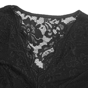 Figursydd svart body-blus i spets