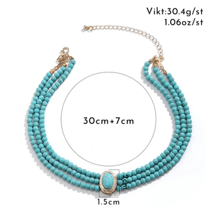 Flerradigt choker-halsband med turkosa pärlor
