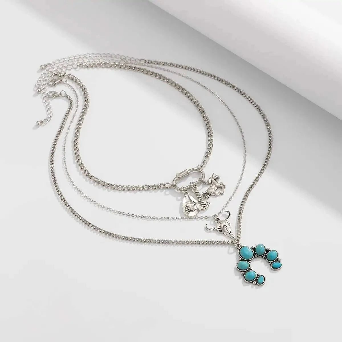 Flerradigt halsbandsset i western stil med turkos och cowboy-berlocker Silver med 3st