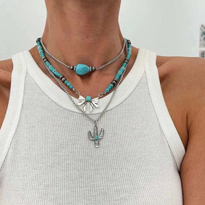 Flerradigt halsbandsset i western stil med turkoskors och choker Stil  2
