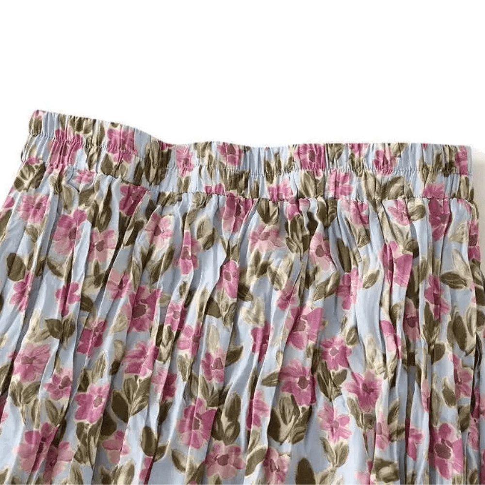 Lång plisserad kjol med blommönster