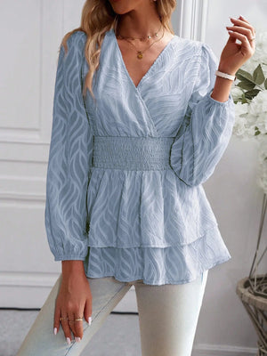Smockad blus