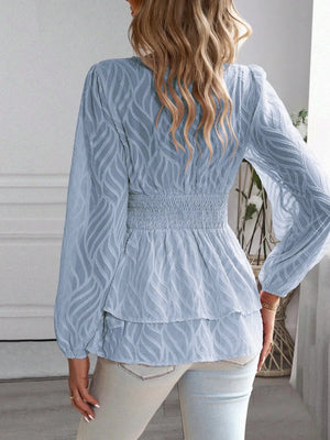 Smockad blus
