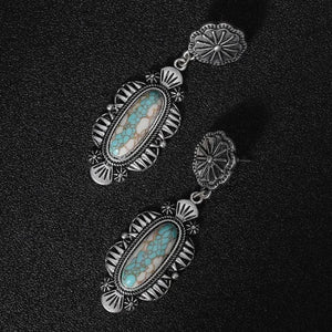 statement-örhängen i silver med turkos
