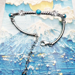 Stelt Silverarmband med Vriden Design och Turkosa Stenar Silver med turkos