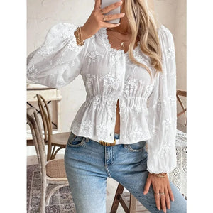 Vit broderad blus i broderie anglaise med ballongärm