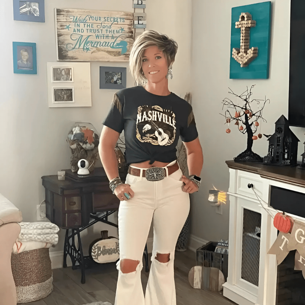 Westernbälte i präglat tläder med djurmotiv och retrospänne